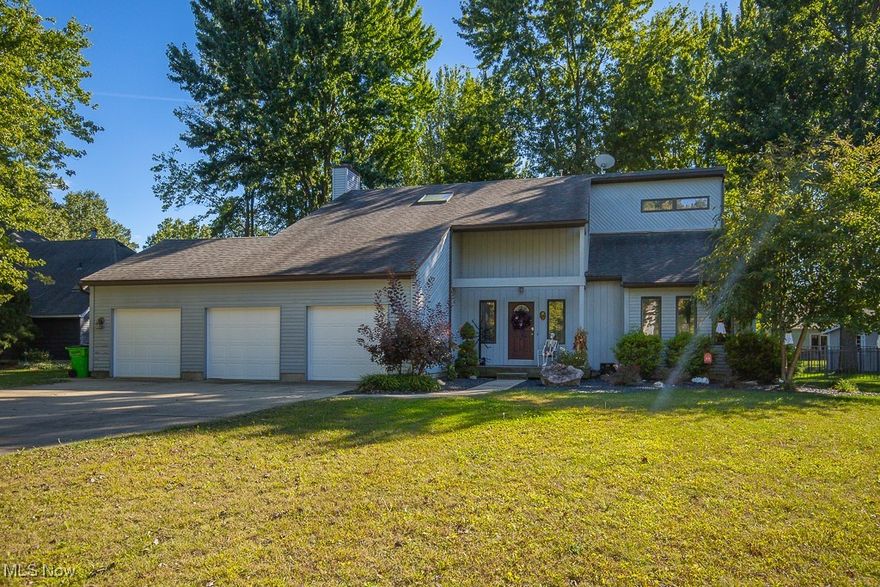 Welcome Home is the heart felt emotion you feel while approaching this amazing well manicure colonial situated on a large Cul-de-sac lot.  Offering a 3-car attached garage, amazing curb appeal, and perfectly located minutes away from the lake, highway, stores, and dining, this home is a must see.  Featuring almost 2500 finished square feet, this well designed and beautifully decorated home boast with character you'd fall in love with. Vaulted ceilings, new flooring throughout and spacious rooms accented with wood trim greets you when you enter the home.  A large kitchen and cozy family room leads you to a huge and beautiful fenced yard offering mature trees, a deck and a stone patio that is perfect for entertaining.  A basement with putting greens offers a perfect practice area for golf lovers that want to improve their game. Large master on suite, two additional generously sized bedrooms, and a loft perfect for an office or reading area completes the package of your new home.  Seller Motivated.