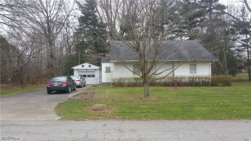 3 bedroom Cape Cod with 1 car garage on 11 lots on dead end street.  Home needs some work but has potential.  Must see inside.  Digging for sewer project to begin January 2017.