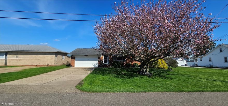 Welcome to this charming ranch home! You'll be delighted by the ample space it offers, plus it has been freshly painted by a professional painter. The kitchen cabinets are a huge bonus, and the pass-through window makes entertaining a breeze. If  you are a cooking or baking enthusiast. The cabinet and countertop space is a huge winner. You'll also love the three-season room off the garage, which opens up to your fully fenced-in backyard and covered deck. The primary bedroom boasts a huge closet, adding to the home's appeal. The abundance of windows lets in plenty of sunshine always a plus! The sellers have always been pleased with their utility expenses. Plus, you?re close to the Towpath Trail and routes 21 and 30.   Shopping and restaurants galore!