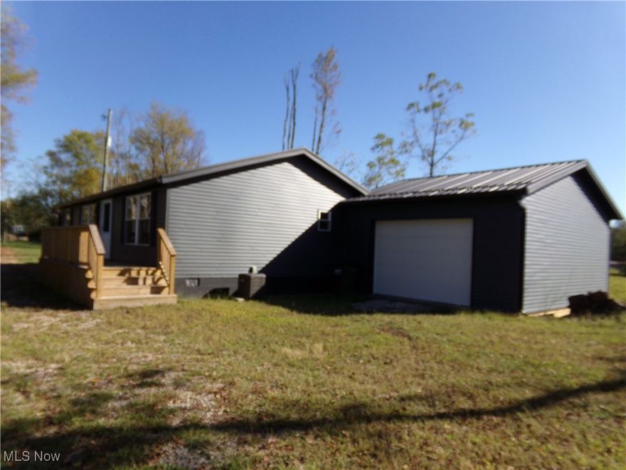 Acreage- Privacy all with a completely remodeled home. close to the interstate
NEW PROVIA windows, exterior doors, & siding. NEW matted steel roof from Stoney Point along with spouting to match.
2 New decks, NEW attached garage, NEW subflooring & laminate through the house. NEW interior doors, NEW kitchen cabinets & Island, All NEW appliances, NEW service panel, wiring, lighting, outlets, switches by Joe Dump Electrical. All NEW plumbing, NEW heating & cooling units, completely NEWLY painted & NEW trim, NEW smoke detectors, NEW Aerator in septic. CLICK on virtual tour icon to view land