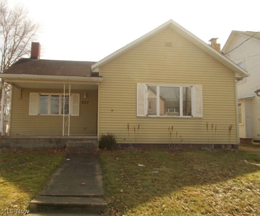 Adorable 2 bedroom ranch style home that is cute as a button! Come experience one floor living at it's finest! Large living room with iron wood burning stove! Kitchen with tons of cabinets and counter space galore!! Nice sized bedrooms and formal dining area too! Fabulous 3 car detached garage with large finished room above! Being sold as-is. Call today to schedule a private tour!