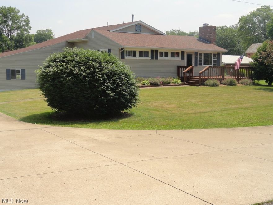 Got Cars....Need a Shop....Love to Cook...? We have the place for you! Great ranch home with plenty of space inside and out. Chefs kitchen with huge center island and enough dining space to have the whole family over for the Holidays! Extra large Master suite with private bath and additional seating area  for an office or reading room. Some hardwood floors and partially finished lower level. Multi level deck perfect for entertaining. Attached 4 car garage plus additional 2 car 24X32 building with separate electric bill. This is a must see!!