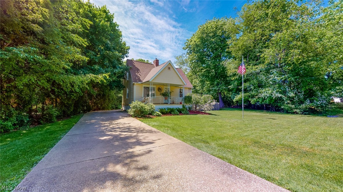 Are you looking for an affordable easy to maintain hideaway with large healthy open green spaces that is quiet and ideal for outdoor gatherings or some private time and yet close to shopping and highways? It even has a big garage with storage, concrete drive, storage shed, set on the deck and look around at the peaceful tranquil views. Put this charmer on your must see list. Owner has been relocated and is sad to leave. It is a one of a kind move in condition completely updated. A true turn-key home fully updated and looks amazing inside and out. Walk in the front door to an open layout design with beautiful wood floors throughout the dining room and kitchen area. The kitchen is finished with modern white cabinets, beautiful glass tile backsplash and nice appliances. The family room is accented by an amazing stone fireplace complete with gas logs, and the big windows letting all that natural light in and cozy carpet. Why rent when you can own and invest in your future for less than you