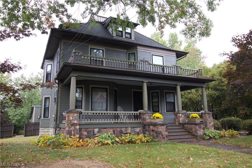 This is a Victorian home with a decorative front porch, Widows weep, on a brick road.  The property features a original carriage house converted into a garage, a wrought iron fence leading to the garden area and a deep two car attached garage.  The exterior has been freshly painted with historical colors and features half round gutters.   The first floor boasts a spacious kitchen with plenty of cabinets and countertops. There is also a formal dining room, Great room, and living room with the original mantle. A foyer has beveled glass doors and decorative wood staircase.  The home has another staircase just off the kitchen.  The flooring on the first and second floors are the original wood floors.  The second floor features four of the five bedrooms, two have walk-in closets.  The laundry room is also situated on this floor.  A roof balcony off the back of the house overlooks the carriage house and garden area.  The third floor features a renovated bonus/bedroom with a full bathroom and walk-in closet. Some updates include: Exterior paint, some electric/wiring, some plumbing, Roof in 2010 on house, slate on the carriage house, Water heater, and third floor renovation (3rd floor renovation completed by previous owner).  Call to schedule your private showing of this historic home before it's too late.
