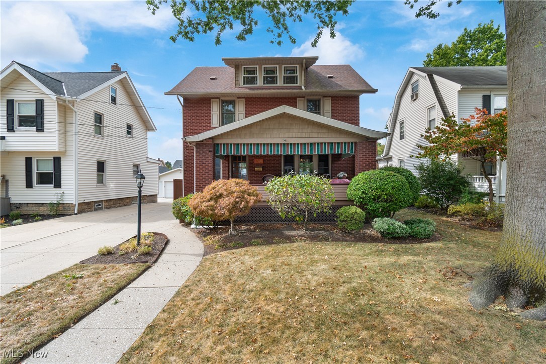 Welcome to this elegant brick colonial, where classic charm meets modern luxury. This home boasts three levels of beautifully finished living space. The heart of the home is a true chef’s delight featuring rich cherry wood cabinets, quartz countertops, and a stunning glass subway tile backsplash with under-cabinet lighting. Solid oak woodwork and beveled glass French doors add a timeless touch to the formal dining room, while the spacious family room offers a cozy retreat with a gas fireplace flanked by built-in bookshelves. The upper levels offer versatile living options with generously sized bedrooms; the top floor could serve as a large, private bedroom or the perfect home office for remote work. The clean, updated basement, complete with a half bath and Nature Stone flooring, provides extra versatile living space. Outside, enjoy quiet moments on the covered front porch or entertain on the immaculate brick patio in the backyard. This impeccable home also includes a detached 2.5-car garage, backyard motion lights, and LeafGuard gutters. Major updates like a newer roof, furnace, central air (2019), and hot water heater ensure peace of mind for years to come.