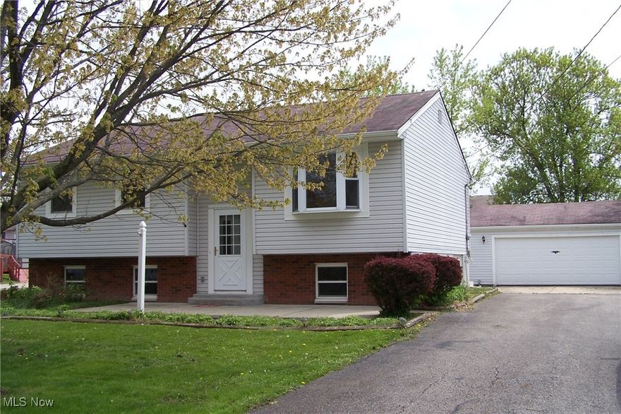 Cardinal Schools.  Great Village location on side street, but close to Walmart, grocery stores, restaurants, parks, and more!  4 bedroom split level home with plenty of living space on both levels.  The .25 acre parcel also includes a 2-car detached garage and a shed for storage.  No pets and no smoking or vaping inside the home.  Available now for your occupancy.  Bring your own appliances.  There is a built-in dishwasher for use.  Tenant is responsible for gas (heat), electric, water/sewer/trash, cable/phone/internet, mowing/landscaping, and snow removal.  Enjoy a fresh start with all new flooring, new paint and a new back deck.