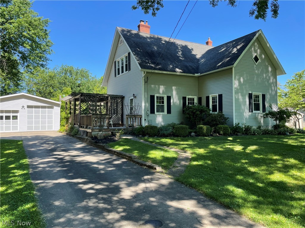 PRICE DROP! Immaculate and incredibly well maintained! Welcome home to 4135 Hattrick Rd. in Rootstown Township. Built in 1925, this now single family residence was once the "New Milford School House" and you will find original woodwork throughout. Sitting on a beautiful 1.35 acre lot, this 2462 sqft home features five bedrooms, two full baths and a large unfinished portion on the second floor with tons of potential. Exterior features include a 24x30 2 car garage with rear door, 2 good sized storage sheds (12x16 & 12x20), and a large side deck, perfectly shaded by mature trees. This is one you don't want to miss! Schedule your private showing today.