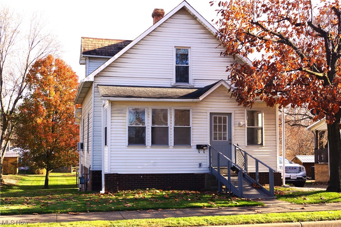 Meticulous and Move in Ready home in Minerva! Enter this great home into the carpeted enclosed porch and then into the foyer area large enough for a home office! This fabulous 2 bedroom, 2 full bathroom home, is located in a great area! Easy walk to downtown, restaurants, grocery stores, churches and more! Gorgeous oak woodwork throughout the house. You will love all the cupboard and counter space this eat in kitchen has to offer! Off the kitchen is a formal dining room and then into the spacious living room. Full bath one the main level and full bath upstairs. 2 large bedrooms upstairs have huge closets! Some are walk-in. The storage space this home has to offer is awesome! Laundry area with lots of cabinet space and toilet are located in the lower level. Walk out lower level through another enclosed porch. Updated features include 100 AMP electric service, hot water boiler is a 3 year old closed system, and new water softner system. All carpets recently scrubbed. Immediate possession with time to move in by Christmas! Great condition! Front ramp can easily be removed. Selling to settle an estate.