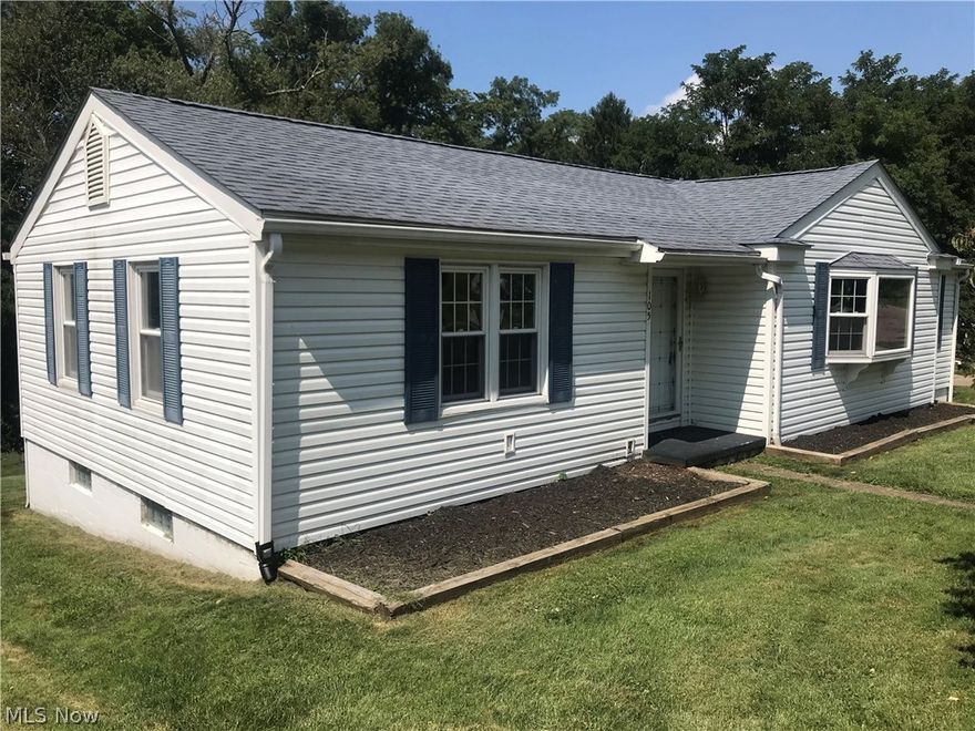 Move in ready 3 bedroom 2 bath ranch with a finished basement and 1 car garage.  Home sits on a corner lot of a dead end street and close access to state route 22.  Kitchen has stainless steel appliances and a sliding glass door to a covered deck.  Large living room, dining room combination has beautiful hardwood floors.  Finished walk out basement with a full bath and one car garage. Newer high efficiency central heat system and central air.