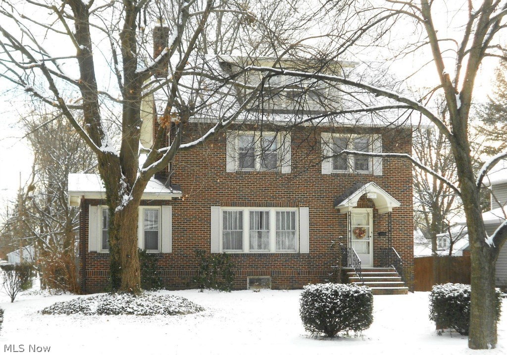 Gorgeous all brick 4-5 bedroom Colonial is loaded with charm & character! Amazing natural woodwork & attention to detail throughout the home - from French doors & trim work to solid wood doors with crystal doorknobs. The spacious living room is accented by a woodburning fireplace & leads to the formal dining room with built-ins. This home features an added bonus of a first floor office/sun room & a finished third floor with a possible fifth bedroom. Updates include some newer appliances (2014), granite counters & flooring in the kitchen, remodeled baths, refinished hardwood floors, new carpet (2014) & a freshly painted interior. A new roof was installed November, 2014! A home warranty has been offered for peace of mind.