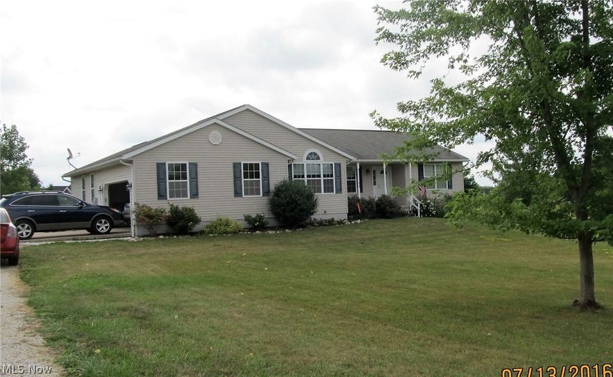Country ranch situated on 3 acres, built in 2006. 3 bedrooms, 3 full baths, large eat-in kitchen with oak cabinets and ceramic floor, expansive living room with combined dining room area, french doors leading to recently painted deck to enjoy Summer evenings and country views. Private master suite on one side of home and 2 large bedrooms on opposite side of home. Master suite has large master bath with jetted tub and walk-in closet. Oak woodwork throughout. 6 panels doors. First floor utility room. All appliances stay including washer and dryer. 34x26 finished lower level rec room, large full bath with double shower. Electric company is City of Seville Elec. Located in Westfield Twp but has Seville address.