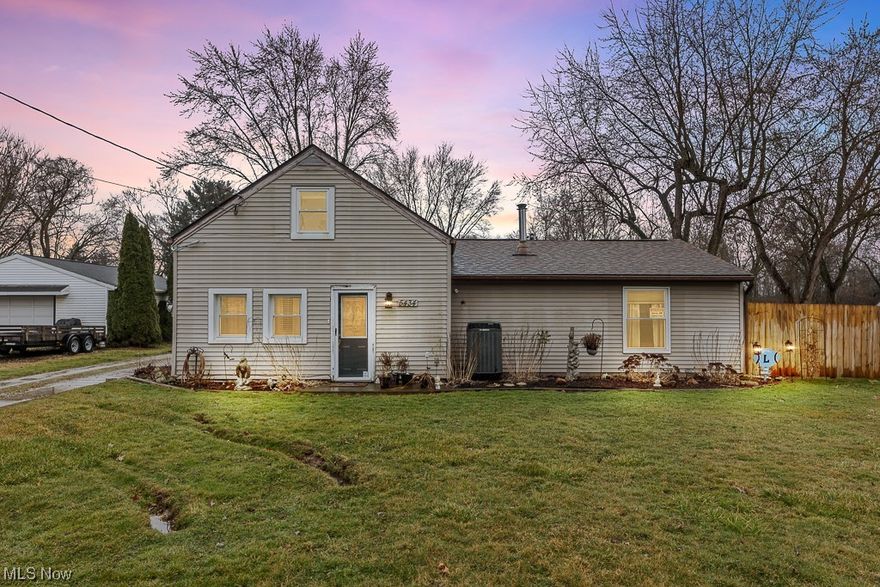 Introducing this charming bungalow nestled on a spacious lot, offering both comfort and convenience. This 3 bedroom home is located in Louisville, Ohio. This cozy home features an open concept with a kitchen, a welcoming living room, and three generously sized bedrooms, providing ample space for relaxation and everyday living. The attached 2-car garage is heated, and ensures easy parking and additional storage space. Step outside to enjoy the expansive yard, perfect for outdoor activities and gatherings. Don't miss the opportunity to make this lovely bungalow your new home sweet home. New HVAC, New flooring, New wooden privacy fence, Updated and tiled bathroom, recessed lighting, etc.