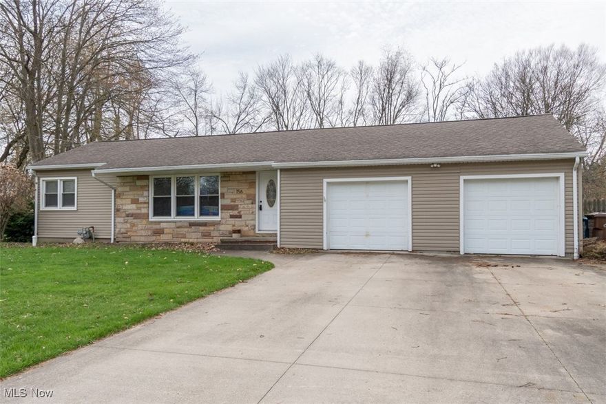 A must see!  Easy ranch style living with 2 large bedrooms and two full bathes. 920 square foot with an additional 500 square foot of finished basement which would be perfect for a family room or a man cave.  Hardwood flooring throughout. The kitchen and bathrooms have been remodeled and updated.  Get ready to host your dinner parties and family get togethers in your dining room with sliding glass doors opening onto your patio, complete with a hot tub and an extra large fenced in  back yard. There is a shed in the back that provides additional storage. Car enthusiasts will love this spacious 2.5 car garage. Solar roof panels and gutter guards have recently been added.  New septic was added in 2018. This home is minutes away from Portage Lakes. This is a rel gem.  Don’t miss out on this one!