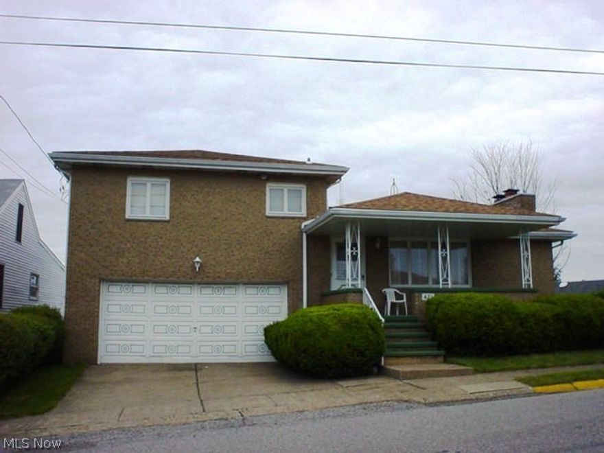 Tri-Level 3 bedroom brick home, 2 car garage, 3 baths, rec room, 2nd kitchen, lower level, 2 fireplaces, large covered front porch priced right for a quick sale.  Sold as is where is.