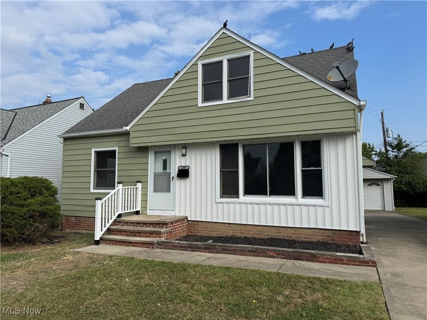 Absolutely stunning totally renovated classic bungalow in sought after, secluded and private pocket of Garfield Heights!  This POS compliant home features updates and modernization throughout.  Fully renovated kitchen with quartz counter tops, custom sink and hardware, new fixture, floors and paint!  Large living room featuring new floors, updated paint, and large picture window overlooking quiet front yard.  Two large first floor bedrooms, renovated first floor full bathroom  with walk in shower!  Huge primary bedroom on second floor with reading nook, attic access for additional storage, and hardwood floors.  All this PLUS a finished rec room in basement, new central AC, new hot water tank, updated electrical, large backyard and two car detached garage with electric openers!   Don’t miss this beauty!