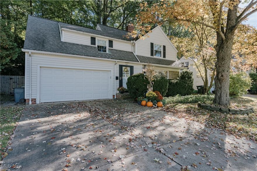 Welcome to 1567 S Belvoir Blvd – a beautifully maintained Cape Cod home perfectly situated just blocks from shops, schools, and a neighborhood park. This inviting residence blends classic charm with modern updates, making it an ideal setting for family living. Step through the front door into a welcoming foyer with slate tile flooring, flowing seamlessly into the formal living room. Here, an elegant fireplace and a large, light-filled window create a warm and inviting space, while gleaming hardwood floors extend into the dining area. French doors open from the dining room to a sunroom at the back of the home, complete with a sliding door that leads to the backyard patio – perfect for indoor-outdoor living and entertaining. The kitchen is a chef’s delight, featuring stone countertops, a convenient breakfast bar, stainless steel appliances, and ample cabinet space. A half bath off the kitchen completes the first floor. Upstairs, three spacious bedrooms with hardwood flooring share a full bath, offering comfortable and private retreats for family members. The lower level boasts a finished recreation room, ideal for play, hobbies, or relaxing, alongside a functional laundry and utility area. Outside, the backyard is perfect for entertaining and relaxing, featuring a spacious patio and deck that flow effortlessly for gatherings or quiet evenings. A winding pathway leads to a peaceful wooded area, offering privacy and a serene natural retreat. Additional highlights include an attached 2-car garage, generous storage, and a prime location that blends convenience with neighborhood charm. This home is ready for your family to move in and create lasting memories!