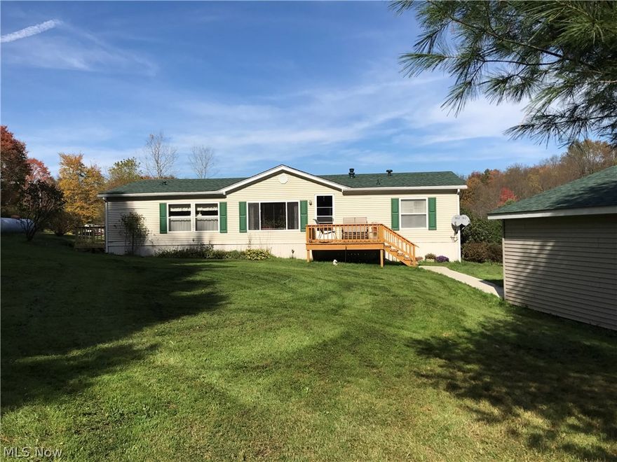 Three bedroom, two full bath one owner home with detached garage.  Home was built with 2 x 6 walls for that extra insulation.  Fireplace in living room with a  heatilator  11 acres with a Nice country setting.  Pasture for those animal lovers has electric fence Buyer will need to install the charger.   Deck, sidewalk and roof on house and garage  were installed in  2016.   All appliances will stay, including the washer and dryer.  New carpet in living room and dining area.  Call for your private tour today. Property is being Sold "AS IS"