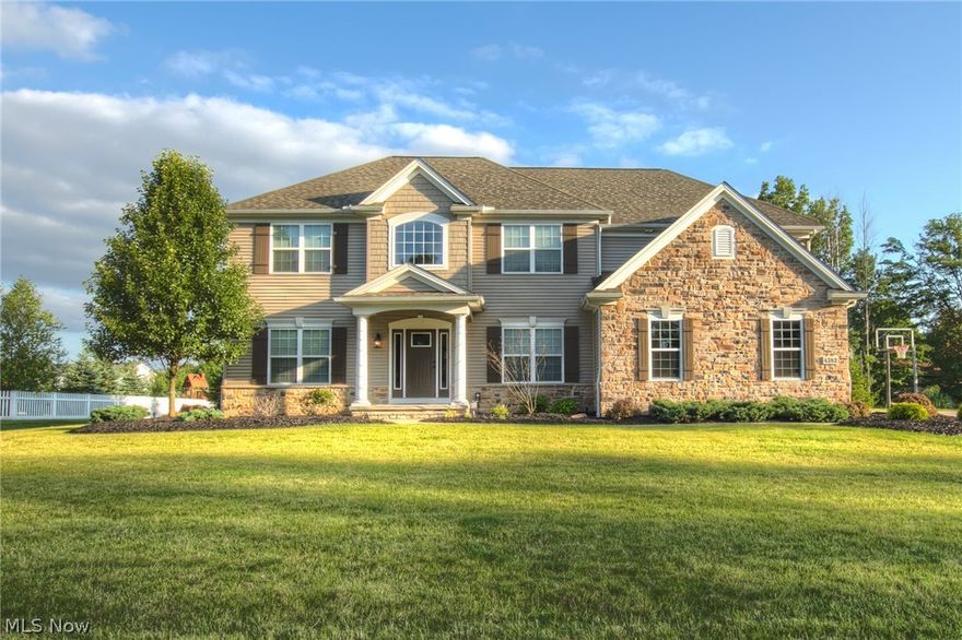 Great location, lots of space, many upgrades! This 2011 custom-built Petros home offers 5 bedrooms and 5 full baths, plus a finished basement with an additional full kitchen! As you enter the two-story foyer, you will immediately notice the beautiful wrought-iron staircase banisters and the natural light flowing in from the many windows in the vaulted great room. The main floor also offers a bedroom with attached full bath, perfect for guests. The kitchen features ample cabinetry, granite countertops, custom backsplash and range hood. Upstairs you’ll find the spacious master with double walk-in closets and bathroom with dual vanities, soaking tub, and tiled shower. Three more bedrooms (one with an en suite bath) round out the second floor. Looking for even more entertaining space? You’ll find it in the professionally finished lower level ($120K) featuring a full kitchen (granite countertops plus brand new appliances), family room with stone feature wall, a full bathroom, exercise room,