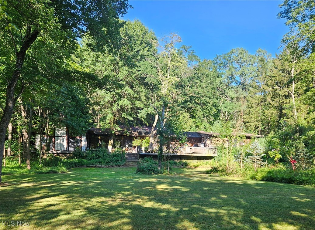 Architectural Masterpiece on the Chagrin River! Private 11-Acre Retreat in Novelty, Ohio
Discover a rare opportunity to own a breathtaking 11-acre sanctuary nestled along the scenic Chagrin River. This extraordinary estate offers unmatched privacy, serenity, and natural beauty, backing directly to protected Land Conservancy acreage for uninterrupted views and lasting tranquility.
Designed by renowned architect Thomas Ware and inspired by the timeless vision of Frank Lloyd Wright, this 4,000 sq. ft. home is a harmonious blend of organic architecture and modern elegance. Floor-to-ceiling windows and an expansive deck that wraps the entire exterior invite the outdoors in, creating a seamless connection to the lush surroundings. Whether you're seeking a peaceful retreat, a creative haven, or a legacy property, this one-of-a-kind estate delivers. Experience the art of living in harmony with nature? schedule your private tour today.