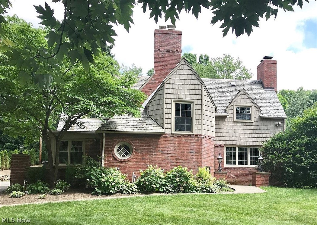 Gorgeous AVONDALE Tudor Home on 0.57 acre wooded lot. This home has today's modern touches while keeping its Old World Charm and Character. This home features 4 bedrooms and 2.5 baths, Hardwood floors, crown molding and wood beamed ceiling and wood burning fireplaces. Updated eat-in Kitchen with Granite countertops and many windows. The backyard features an outdoor Kitchen, fire pit and Gazebo with French doors leading you into the Great Room.