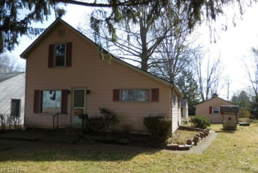 Darling Cape Cod Style home in Berea! This home features a cozy living room with built ins.  Formal Dining Room.  Kitchen offers ample cabinetry and counter space.  3 Bedrooms; 2 Full Baths.  Basement access is through the outside storm shelter doors. 3 Car Garage and an out building included.  Deep lot, great for entertaining and cook outs.  Close to freeway access I-71 and the turnpike.    Great area with lots of charm and character.  Bring your personal touches and call this home.  Schedule your showing Today!!