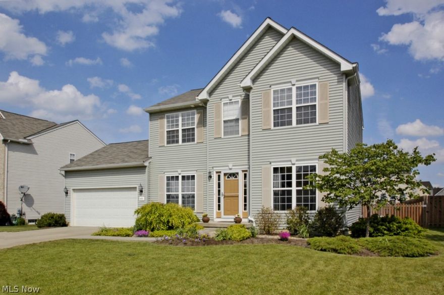 WOW! Stunning newer built colonial in phenomenal, highly sought after location! Located in the estate lot section of Martins Run, this home has one of the largest lots in the development. Stylish design and refined spaces make this extraordinarily nice home the top choice for you! The chef in the family will have plenty of room for preparing favorite recipes in the large open kitchen with tons of cabinet and counter space, kitchen features a beautiful eat in area, over looking the fully fenced in back yard. Breakfast bar in kitchen is open to the large great room, creating the open concept floor plan you are looking for! Entire first floor has amazingly upgraded laminate wood flooring! A walk upstairs leads to the private owners' retreat where you can relax after a long days work, here you will find tons of natural lighting, beautiful trayed ceiling and HIS and HERS...massive...walk in closets and your own large private bath. The 2nd floor also features the additional full bath which i