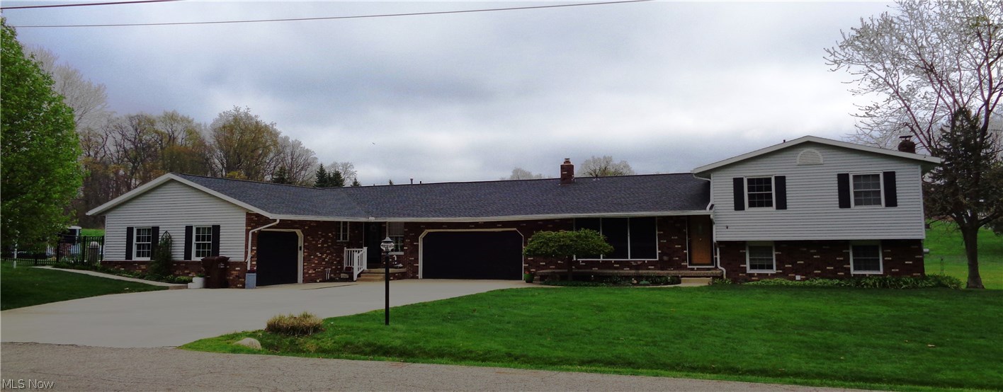 Four level split, with in-law-apartment, 4 bedroom- 2 bath home plus a 2 bedroom, 2 bath in law apartment. Split level was updated 2002- dream kit- double oven-cook top-veg sink-breakfast bar-eating area-slider to deck, FR-brick wall fireplace mass-gas logs-bookcases-French door to patio,-full bath w/dressing area-cedar closet -2 car garage w/workbench-fan-attached kennel-fenced run-approx. 1700 sq. ft. Reverse osmosis. newer well pump, furnace, air, h/w tank, roof, windows. Laundry room with washer/dryer(Maytag enhancement), 2 storage barns, 20 x 40 in-ground pool-heated- w/nature stone- gazebo. In law apartment built in 2002-2 bed-2 bath-LR-Kit with appl.-oak-finished basement w/chair slider-deck-1 car garage-handicap throughout-approx. 1200 sq. ft. Lot is irregular frontage 162 back 299- America's Preferred Home Warranty on the split level only. Motivated Seller