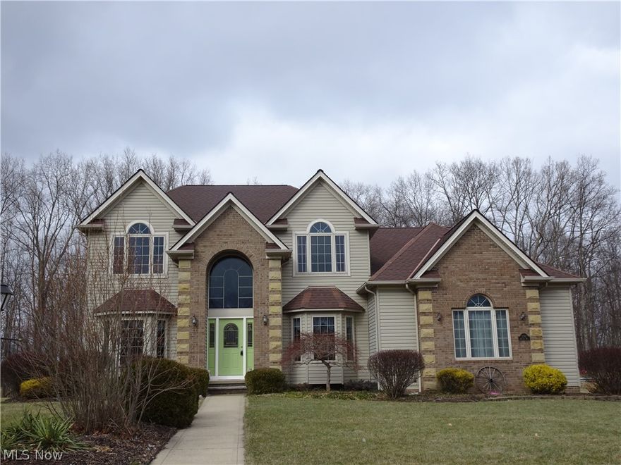 Stunning 4 bedroom, 3 bath Europa built center hall colonial with side load 3 car garage on a lovely.56 acre lot. As you enter the grand foyer (with custom chandelier) is flanked by a formal dining & living room. The eat in kitchen (with stainless steel appliances) features a slider to the backyard oasis, a center island, pantry, loads of cabinet space and opens to the family room with a gas log fireplace. For your convenience there is a 1st floor laundry and mud room just off the spacious garage. The master suite has a luxury whirlpool bath and 2 walk-in closets! The full basement is ready to finish and roughed in for an additional bath or spa! Recent interior upgrades include the living & dining room flooring, trim, chandeliers, carpet in the master suite and paint throughout. The exterior features a custom patio with newer walkway, a pond with a waterfall (and bull frogs!), gazebo (with full concrete pad) and privacy galore! This home is located convenient to the interstate, Metro P