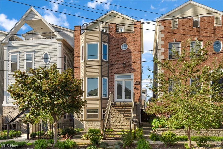 Nestled in the heart of one of Tremont's most sought after blocks, 2158 W 5th is a rare find! Steps away from the towpath trail, views of downtown, and all Tremont has to offer. Enter into an impressive 2 story foyer equipped with original hardwood flooring and a spacious formal dining room w/ bay windows overlooking downtown! The open floor plan highlights the main level living, featuring a good sized kitchen with 2 islands, white shaker cabinetry, granite countertops, stainless steel appliances, and plenty of storage. Sunken LR off the kitchen with full stone fireplace and large windows overlooking your private courtyard. Large Master suite w/ dbl walk in closets. Updated full bath w tiled shower shower and oversized spa tub. Amazing views in the guest suite off the front of the property. Bedroom level laundry! Incredible third floor space highlighted by vaulted ceilings, natural light, and breathtaking views from the private roof top patio. Newer flat roof on roof terrace! New Anderson windows on 1st, 3rd + in guest room!  Cozy fenced yard w/ patio! 
Lower level/basement one bedroom rental suite has been fully updated. Separately metered. New vinyl flooring, granite countertops, fresh paint on walls and cabinetry, and new cabinetry hardware. Excellent opportunity to supplement your mortgage payment with rental income. Ideal Short term rental space. Detached 2 gar garage with access of W 6th. Enjoy your best city living here!