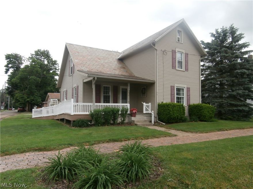 Ready to move in!  This two story has plenty of room with 3 bedrooms, large kitchen with built-in breakfast bar, formal dining room, spacious living room, first floor master bedroom with adjoining full bathroom and first floor laundry.  The upstairs has two additional bedrooms plus a bonus room open to the staircase.  Perfect for an office or den.  The enclosed patio has wall to wall sliding glass doors with screens to enjoy the summer breeze.  The 2 car garage has an attached workshop or hobby room.  You will enjoy the beauty of the fenced in yard.  Plenty of room for a garden.  The outside shed houses a brick oven - a little bit of history.  Wheelchair accessible.