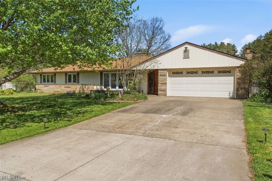 Welcome spring in this delightful ranch-style home nestled on a level corner lot in charming Devola!  Bursting with warmth and thoughtful updates, this 3-bedroom, 2 full bath home has so much to offer. Step inside to a bright and inviting formal living room featuring a cozy gas log fireplace, ideal for those crisp spring mornings. The heart of the home shines with a beautifully remodeled kitchen (2020), designed with functionality in mind. The spacious dining & family room combo creates a welcoming space to gather, complete with bamboo flooring, built-in bookshelves, and a charming wood-burning fireplace.Downstairs, a spacious 24x24 finished rec room provides endless possibilities, perfect for entertaining, hobbies, or a quiet retreat. This home has been lovingly maintained with updates including a new roof and gutters (2019), a 3-year-old hot water tank, added insulation for year-round comfort, and offers energy-efficient Andersen windows. Outside, enjoy the beauty of the season with well-kept landscaping, a large back patio, a dedicated garden area, and a handy storage shed.  This home is ready to make you fall in love...just in time for spring!