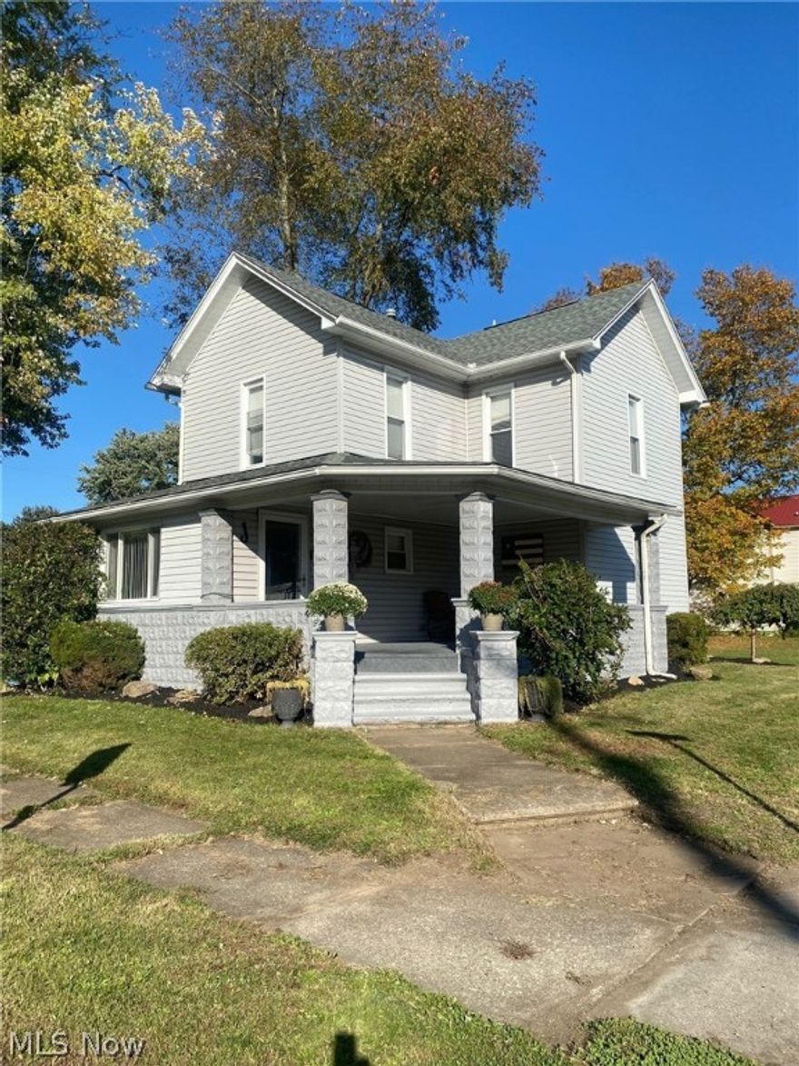 Welcome home to this nicely redone 3 bedroom 1 1/2 bath 2 story home!  Located in Tuscarawas on a level corner lot with a 2 car detached garage, shed and deck.  First floor laundry,  large eat in kitchen and spacious living room.  Full bath on main floor.  Many updates in the past 5 years; bamboo hardwood and ceramic tile flooring, counter tops, backsplash, appliances to name a few.  Roof 2018, A/C 2019.  13 x 7 finished area in lower level has washer/dryer hookup and ceramic tile floors.  Schedule your showing today!  Custom bar in garage does not convey