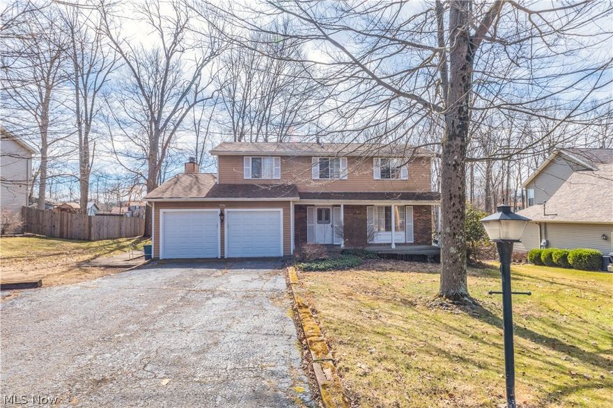 Conveniently located near Austintown Township Park, this classic and spacious 4 bedroom, 2.5 bath Colonial style home is looking to be the next place you call "home!" Upon entering, you will be greeted by the formal living room which is open to the formal dining area. An eat-in-kitchen adjoins the family room, which also features a fireplace making for a comfortable and cozy space for relaxing or entertaining. In addition to this and located off of the family room, is a sunroom, which offers plenty of natural sunlight and view of the backyard. The second floor offers 4 generously sized bedrooms, while the full basement allows for plenty of storage space. New carpeting throughout. Call today to schedule your private tour!