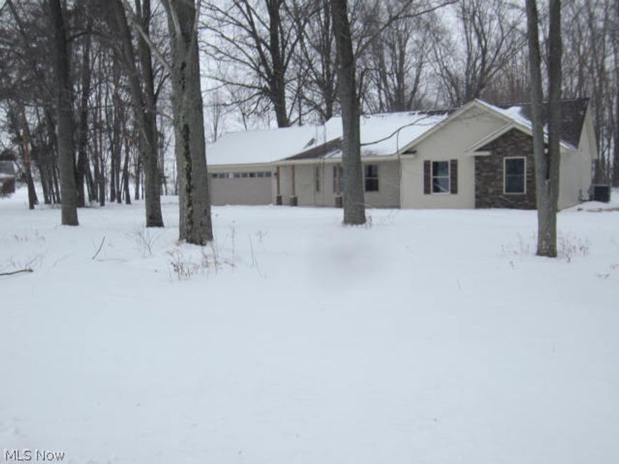 Brand new rustic 3 bedroom ranch, 2 full baths, attached 2 car garage with opener,  sitting on an acre wooded lot.
Lots of storage, lovely cupboards, laundry area with cupboards for storage and a "mud" room with storage for shoes, boots and coats.  Hickory wood work adds to the rustic feeling of the property.  Lovely front porch.
 Wellington Schools.
Taxes will increase due to new construction.