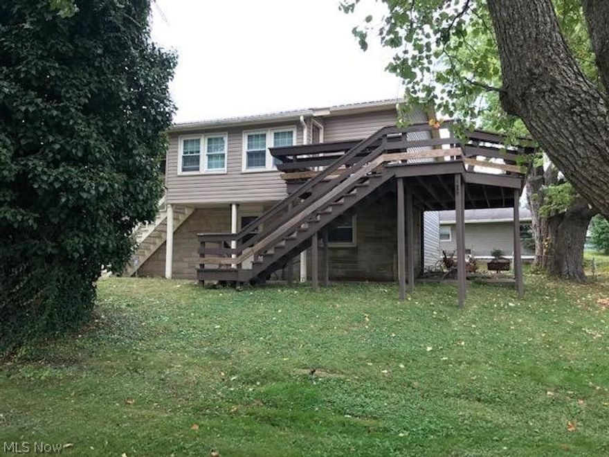 Very convenient location for this raised ranch. Located at the end of a dead-end street, next to YMCA, very close to City Park & Elementary School. Eat-in kitchen w/ appliances, Master bedroom has built-in desk & slider to deck. Ohio State family room, downstairs bath has shower no tub. Washer, dryer, kitchen table & chairs all stay.  Level lot. Ready to move into condition, Owner has never used EBB heat! MWCD assessment is $6.00/year.