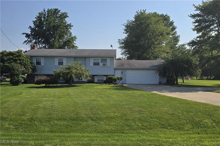 Welcome to this spacious beautifully decorated bi-level home offering over 2,000 square ft! This home features an open airy floor plan, perfect for everyday living and entertaining. Main floor features 3 generously sized bedrooms, master has its own master bath and 2nd bath for guests. This home also has a bright and inviting kitchen with huge center island that is open to dinning area as well as to the large living room. This also includes an patio door to a beautiful deck overlooking a huge back yard which also includes a patio below for cookouts and entertaining. Downstairs boats a large family room with beautiful chair rail detailing, a cozy wood burning fireplace and a built-in bar. an additional large bonus bedroom for your guests, a home office or flex space- as well as a huge laundry room with plenty of room for storage and organization that also has access to the large 2 car garage. The all cement driveway gives you plenty of parking for large RV or additional guests. This home offers both function and style with plenty of room to grow. Don't miss this opportunity to own a move-in ready home in a desirable area!