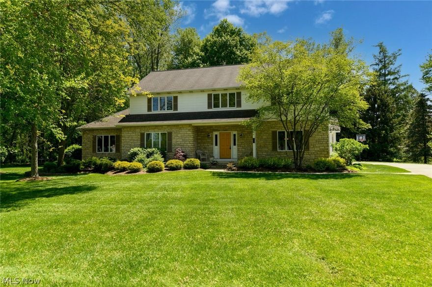 Love the life you have while you create the life of your dreams in this beautiful Brecksville Emerald Woods home. Sunny front door opens to gracious foyer. To the right, a formal dining room can host intimate gatherings or dinners for a crowd. French doors lead into the extra spacious eat-in kitchen. To the left of the foyer is a formal living room made cozy with a gas fireplace. Family room picture window frames the extraordinary 3/4 acre wooded backyard, with a door that accesses the angled 32' x 22' Trex deck, with stamped concrete patio & walkways. 1st floor office/bedroom, laundry & full bath are located in a separate wing off the family room. Upstairs, you'll find the owner's suite, with vaulted master bedroom, generous 12' x 11' walk-in closet w/access to completely floored, 31' x 20' walk-in attic, and a gorgeous, well-appointed full bath. 3 More bedrooms and full bath complete the 2nd level. The kitchen is a gourmet's delight, featuring double oven, 2 dishwashers and a 2nd pre