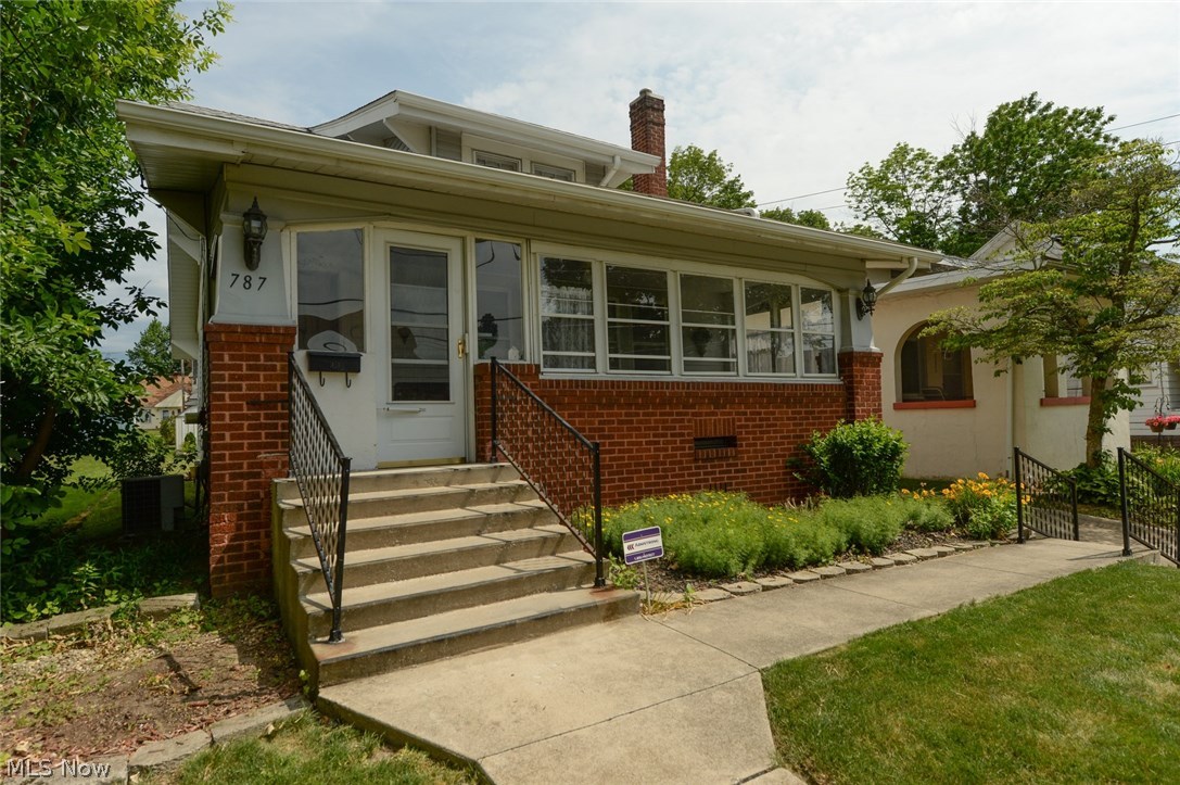 Beautifully maintained home with lots of updates and tons of original charm. All new carpet throughout the first floor! Brick fireplace and wooden book shelves in living room and bench with built-ins in dining room. Spacious kitchen with lots of counter space. Dishwasher, refrigerator and gas range are all included. Second floor can be used as a one bedroom apartment. It would also be great as a master suite, in-law suite or private living space for young adults. This area has a small bedroom, open living room, complete eat-in kitchen and large bathroom. You will find even more living space in the partially finished basement with a half bathroom and stand alone shower. Updated electrical, sump pump and the washer and dryer stay. Enjoy the neighborhood while sitting on the lovely enclosed front porch. The well manicured back yard is the great for children, pets and gardening. This home provides options for all of your needs. Call for your showing today, to see how perfect i