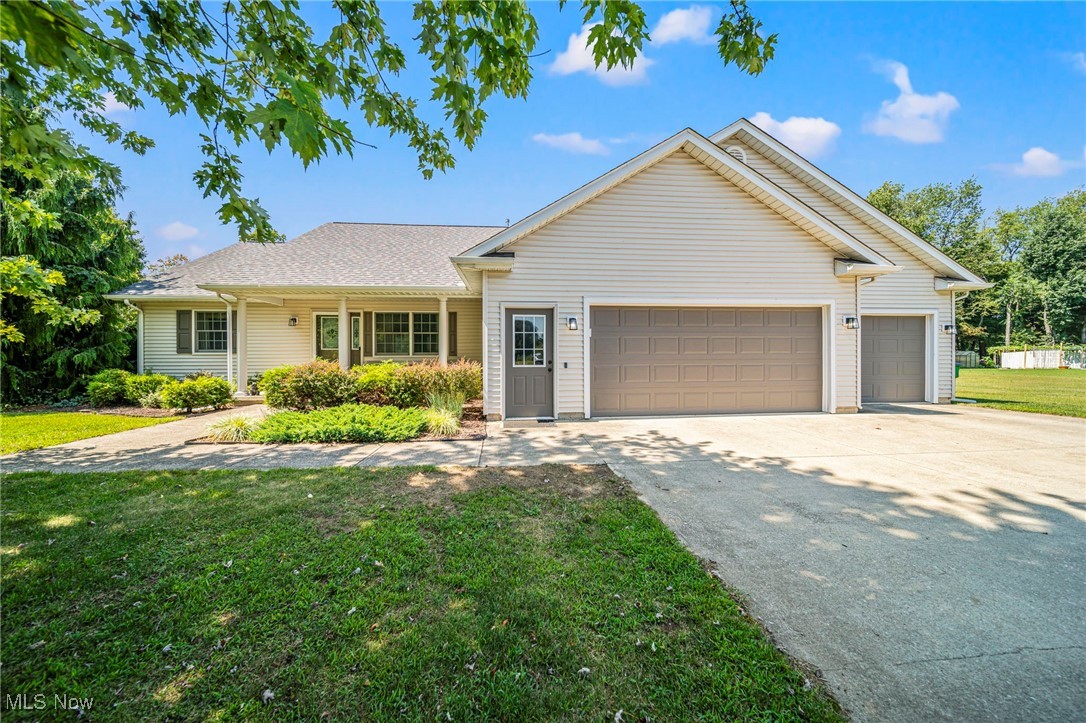 This beautifully maintained three bed, two full bath ranch offers almost an acre of peaceful living. Inside, you'll find a bright, open layout with luxury vinyl flooring throughout and fresh interior updates. The home features a bonus partially finished room upstairs (not pictured), perfect for a home office, hobby room, play area or extra living space.
Recent improvements include a newer hot water tank, roof, refrigerator, washer and dryer, all new interior doors, and a freshly poured cement pad with updated backyard fencing. The spacious and private yard includes an outbuilding equipped with electricity, ideal for a workshop or storage, not to mention the three car attached garage and plentiful outdoor parking for those seasonal gatherings. Catch yourself outside on a cool evening, relaxing in your own hot tub that stays with the home.
This property blends comfort, convenience, and thoughtful updates in a prime setting, ready for its next owner to move right in and enjoy.