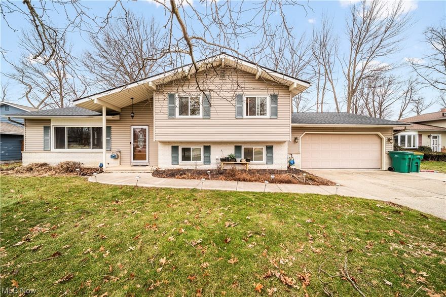 Seller has requested highest and beat by 2/4/2024 at 8pm. All offers will be reviewed 2/5/2024. Discover turnkey living in this 3-bedroom, 2 full bath split-level nestled in the heart of Mentor. Perfectly positioned on a tranquil cul-de-sac, this home is filled with comfort and style. The moment you enter, you'll be welcomed by the spacious living room, with natural light streaming through a large bay window. The updated eat-in kitchen is a culinary delight, featuring quartz countertops that seamlessly blend functionality and modern aesthetics. The adjacent formal dining room provides an elegant space for hosting gatherings. Venture to the second level, where you'll discover three generously sized bedrooms with new vinyl laminate flooring. The second level bathroom has been recently updated with ceramic tile flooring and tasteful design elements. Unwind in the family room, where a large stone gas fireplace takes center stage, complemented by a wall-to-wall mantle and recessed lights, setting the perfect ambiance for cozy evenings. Whether you're entertaining or sipping your favorite beverage, the multi-level back deck becomes an integral part of your living space. With a 5-person hot tub and a 21-foot above-ground pool, this outdoor oasis adds an extra layer of recreation to your daily life, all within the confines of a fenced in back yard. The 2-car garage offers the luxury of heat, water, and a convenient garage door opener. Central air conditioning ensures comfort throughout the seasons and a brand new roof, installed just one year ago, adds to worry-free living. 

This home invites you to turn the key and make it your own – a blend of modern convenience and thoughtful design awaits you in every corner. Welcome home!