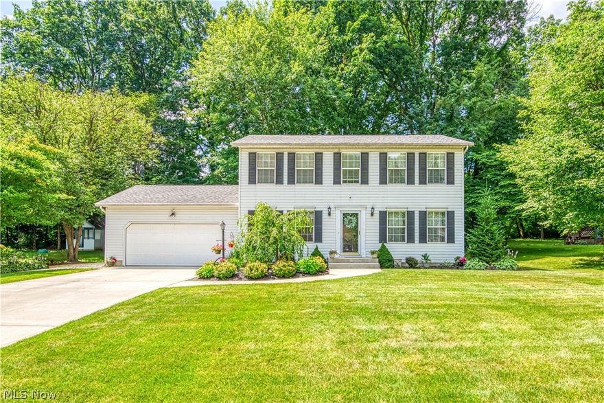 This charming 2 story colonial is very well kept and ready for it's new buyers. Located on a quiet cul-de-sac, this home has a private backyard with patio and oversized shed. Great for entertaining, this yard features an extra space to use for a garden, entertainment, or many other ways. Inside you are greeted with newer vinyl plank flooring, a updated kitchen, living room with newer stone (gas) fireplace. Upstairs you will find 3 bedrooms and 2 full baths, including a masterbath. In the lower level a finished rec room with bar and a extra 4th bedroom finish off this space. Updates include: Gutter guards (2021), flooring in kitchen, dining and 1/2 bath (2021), updated kitchen (2021), shed (2020), hot water tank (2019), fireplace (2017), driveway and front stoop (2015), roof (2017), back patio (2016), well pressure tank (2022)