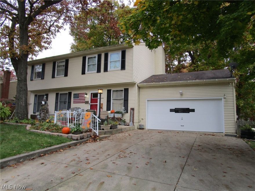 Very Sharp and Clean 4 Bedroom 2.5 Bath Colonial in desirable Girard Neighborhood.  This Home features a spacious Living Room and Family Room with a Fireplace.  There is an updated Kitchen with plenty of Cabinets and Counter Space and a Formal Dining Room.  The Enclosed Porch off of the Family Room is equipped with Electric Baseboard Heat making it usable all year long.  The Full Basement has a Bar and a Rec Room Area.  The Backyard stands out with a Deck, Patio, and Firepit. Back inside there is a Brand New Furnace and Newer Front and Storm Doors.  The Living Room and Hallway have been freshly painted.  This is truly a Great Home.  Make an Appointment to see it soon!