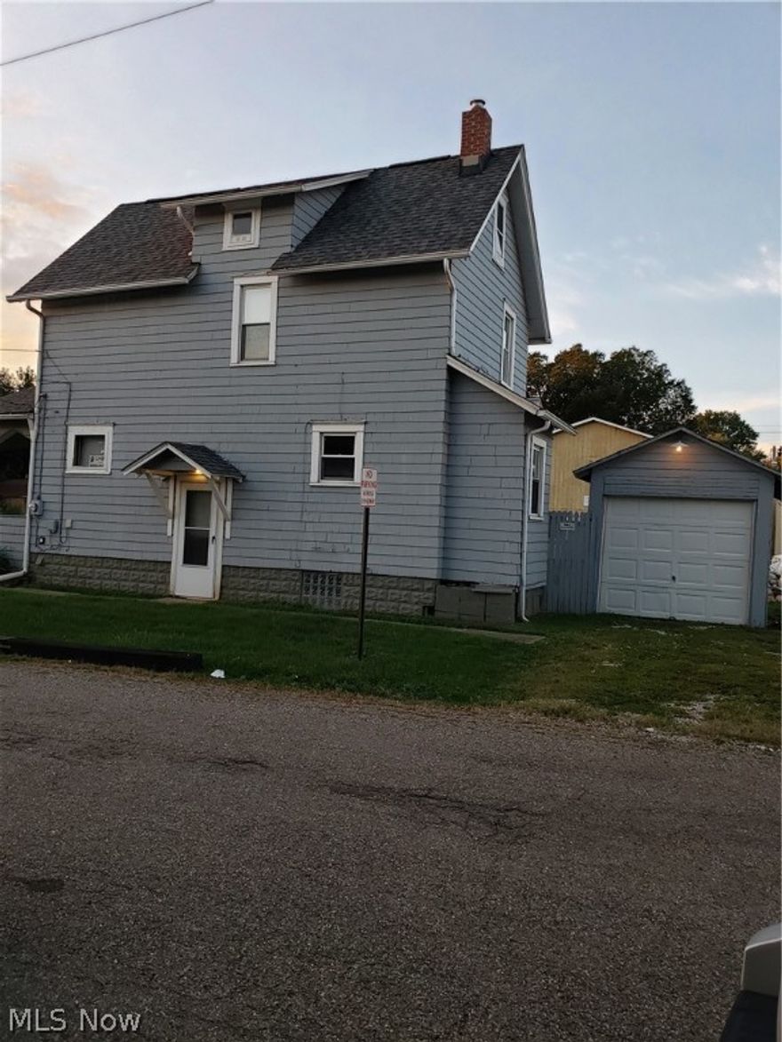 Budget friendly starter home or investment property.  New roof, gutters, chimney work, and exterior painted all done in 2016.  Updated electric service.  Tilt in replacement windows. Nice covered front porch, newer exterior front door. Built in eating area plus a formal dining room.   Home warranty included.  Easy to show.  Immediate possession.