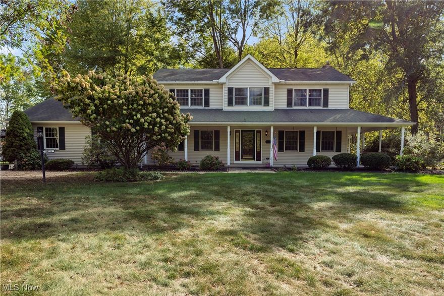 Welcome HOME to 48221 Rice Rd in Amherst, nestled in Amherst Township within the highly sought-after Firelands School District! This stunning 4-bedroom, 3.5-bath home offers over 2,500 sq. ft. of comfortable living space on a picturesque 1+ acre lot. The main floor features a bright living room with a cozy gas fireplace, a spacious family room, a convenient half bath and a first-floor laundry. The kitchen includes solid surface countertops and flows beautifully for both everyday living and entertaining.

Upstairs, you'll find four generous bedrooms and a shared full bath. The primary suite is a true retreat, featuring four closets (including two walk-ins), a jacuzzi tub that can also be enjoyed as a soaker, and a separate stand-up shower. The finished basement expands your living space with a large rec room, a full bath with shower and a versatile bonus room, perfect for guests or a home office. You'll also love the convenience of another basement access directly from the attached 3-car garage.

Outdoor living shines with a huge covered wrap-around porch complete with recessed lighting, a recently stained 400 sq. ft. back deck, and a fenced-in backyard! The 24x24 barn is fully equipped with electricity, an exterior water spigot, and a powered garage door, perfect for hobbies or extra storage. Additional highlights include two water heaters, a radon mitigation system, and easy access to major highways. Ideally located near Lake Erie, Metro Parks and golf courses, this exceptional home offers space, comfort, and convenience in one beautiful package! This home comes with a 1 year Home Warranty and all appliances stay so all you have to do is MOVE IN!