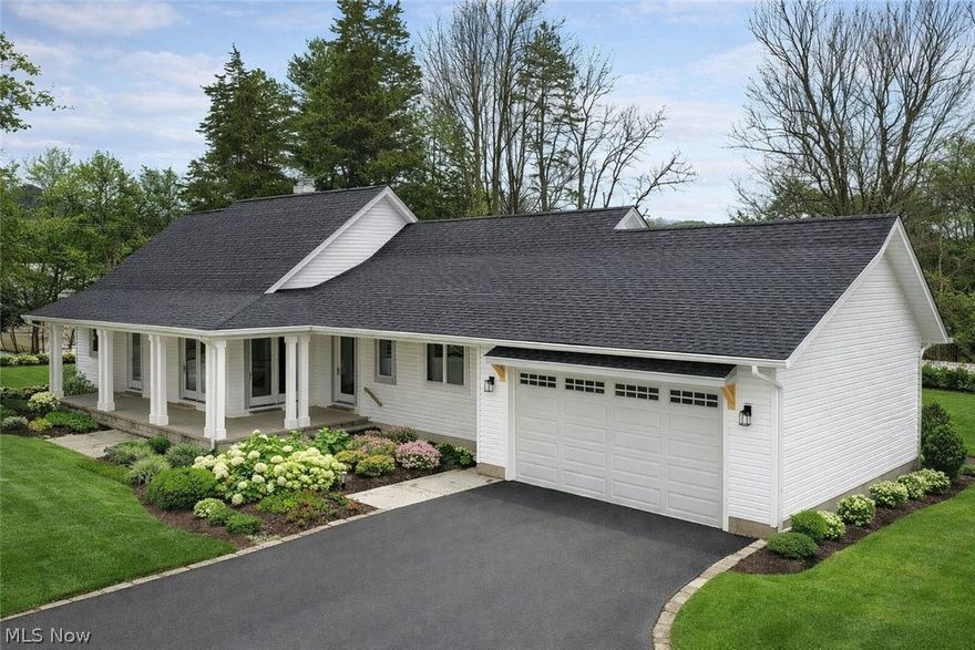 Tucked back off the road with an enchanted long sits this one of a kind, charming home. Peaceful 1 acre lot, with new septic installed in 2025. This sprawling split br design ranch has steps leading to a second level which could be finished with additional bedrooms, hobby room, bathroom or just A LOT of additional storage. The oversized 2 car garage was just added in 2025, as well. HUGE dining area open to expansive and bright great room w/fireplace that someone is going to LOVE hosting holidays in! New driveway just poured beginning of Nov. 2025. Charming front porch and covered rear porch. Master Br boasts lots of natural light, fireplace and a large bathroom and walk-in closet! No carpet- All wood flooring throughout! Large kitchen with built ins, double oven and Island- Gorgeous Hickory cabinetry. Wide, stained baseboards, new light fixtures and the whole house has just been painted in a nice, light & airy neutral color. To see it is to love it. This is a must on your showing list, don't be fooled by just a drive-by!