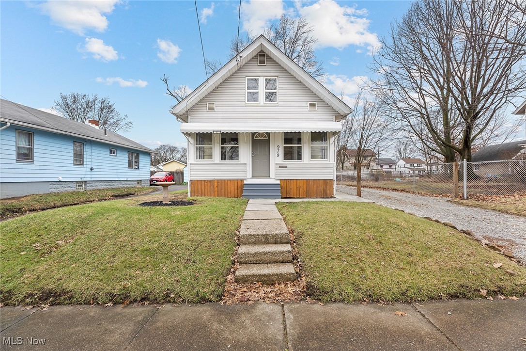 Beautifully updated 2-bedroom, 1-bath bungalow that blends modern updates with classic charm! The open-concept first floor offers a spacious living room, dining area, and a stunning kitchen—completely remodeled down to the studs. Featuring new drywall, flooring, cabinets, sink, dishwasher, range hood, and a stylish island with a breakfast bar, this kitchen is ready for you to enjoy. Fresh paint, new flooring, and updated light fixtures flow throughout the home, creating a bright and welcoming space.
Enjoy your morning coffee in the enclosed front porch, filled with natural light from abundant windows. Upstairs, both good-sized bedrooms offer ample closet space. Step outside to a backyard oasis with a large storage shed, decked sitting area, and a covered patio—perfect for summer BBQs. This home is ready for you!
Recent updates will provide peace of mind, including a new roof (2023), water heater (2022), updated electrical panel (2022), a fully rebuilt furnace (2020), and energy-efficient vinyl siding and double-pane windows. Conveniently located just minutes from shopping, downtown, expressways, and Chestnut Ridge Park, this move-in-ready home is waiting for you! Hurry and call your favorite realtor to see this one before it's sold.