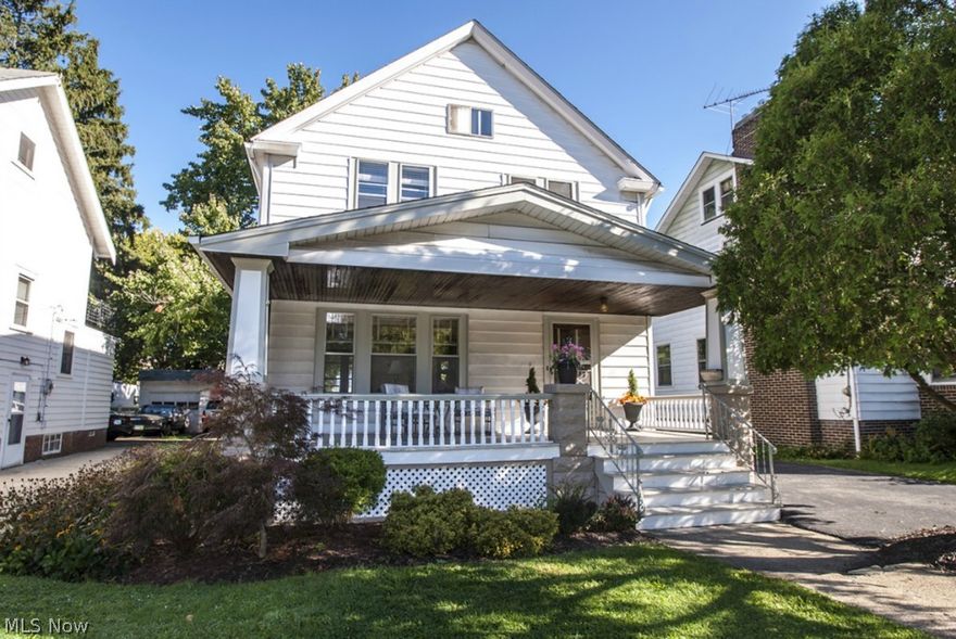 Check out this compelling colonial on prime West Park street within walking distance of  Kamm's Corners! The inviting open and airy porch beckons you inside to the roomy interior teeming with period quality craftsmanship including gorgeous natural woodwork, crown molding and hardwood floors throughout! Spacious living room ideal for entertaining! Charming window seat in formal dining room! Large remodeled bath with airing porch! New roof and gutters 2013! Generous lot with 2 car garage! Some updating needed but priced to move!! Home warranty included!  Will not last!