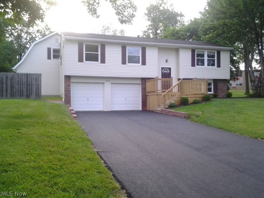 NEW Kraftmaid premium all wood Designer Kitchen cabinets w/premium granite, stainless appliances & lighting! HUGE insulated 2 Story Barn for Dad! NEW Driveway, NEW Porch, NEW Furnace & A/C and NEW Landscaping. You must check this out!