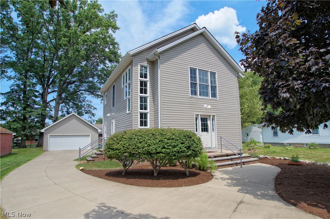 Fabulous unique designed 2 story home has upscale quality finished features throughout! You'll love all the space everyday or when entertaining in the massive great room open to gourmet kitchen with higher ceilings. Features red birch cabinets and maple floors in kitchen with expansive counters and island. Also, spacious bedrooms and larger ceramic finished bath, solid wood doors and washer & dryer in 1st floor Laundry room. Newer: Hot water tank, A/C, washer/dryer and range. Much potential for additional basement suite w/ half bath and plumbing for shower with 13 course height. A long winding cement drive leads to the 24x24 garage w/own electric and overhead storage on a beautifully landscaped lot with deck and fire pit! Walking distance to Chagrin River Park off Reeves Rd. Don't miss it! Bring an offer!