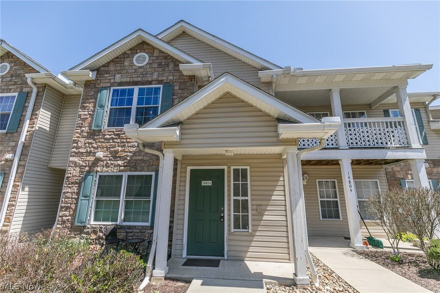 Welcome Home to 14824 Lenox Drive.  This ranch style, maintenance-free second floor condominium in Lenox Creek is located in the heart of Strongsville, Ohio, with convenient access to Route 82 and I-71, making for a short commute to downtown & surrounding communities, or opportune avenues to enjoy all the shopping, restaurants, and entertainment this beautiful city has to offer!  This modern, recently renovated 2 bedroom, 2 full bath condo is sure to impress at nearly 1,200 finished square feet, complete with shielded entry-way, 1-car detached garage (#37), and covered balcony equipped with an extra storage nook.  The moment you walk through the door, you will be in awe of the stained hardwood stairs (2016), wood-look laminate flooring (2015) throughout, and freshly painted present-day color scheme.  The main level features an expansive vaulted great room with elegant stacked stone gas fireplace (2018), open-concept kitchen/dining room equipped with Samsung stainless steel appliances (